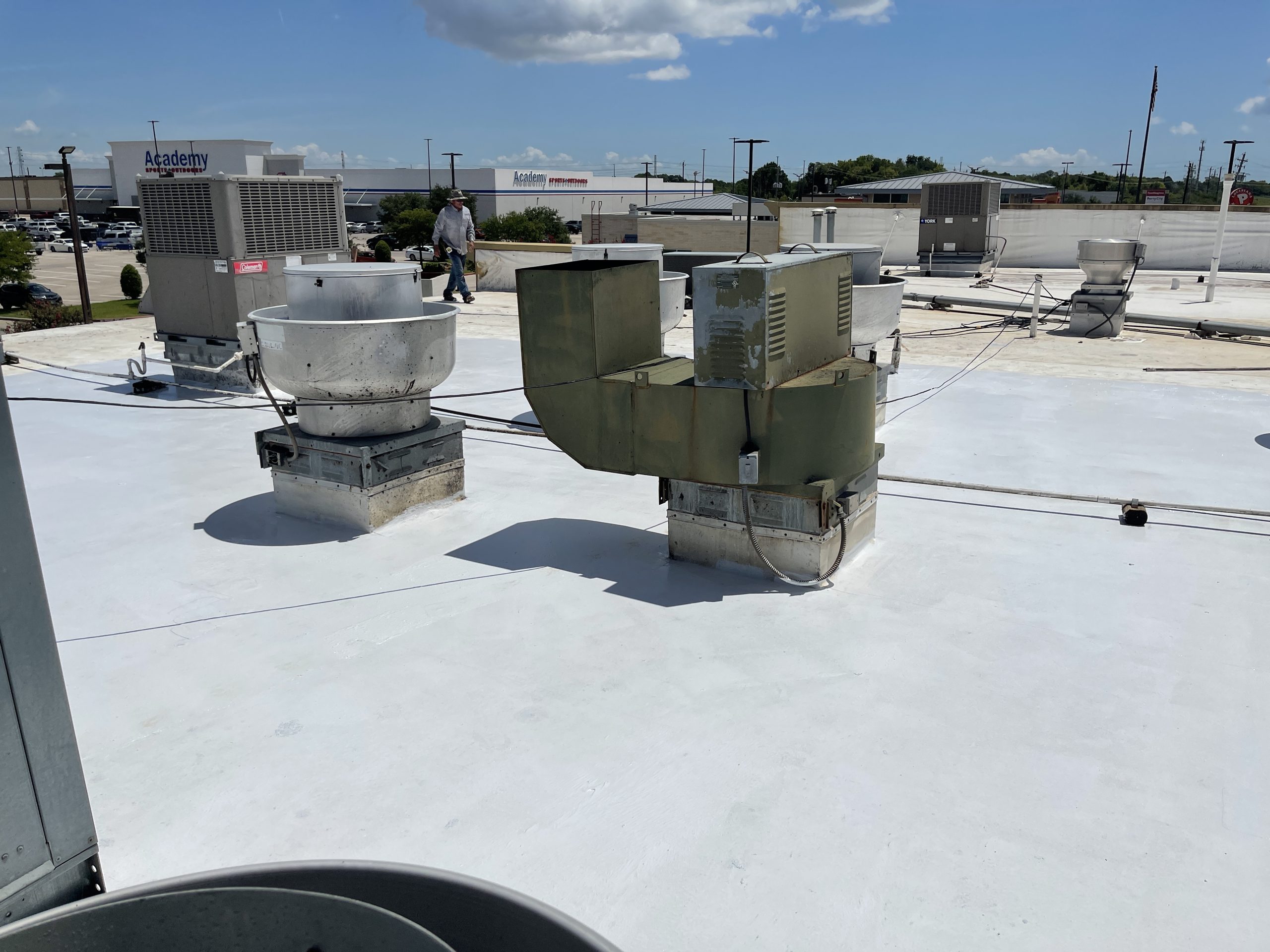 Flat Roof Coating on a Duro-Last Roof in Houston Texas